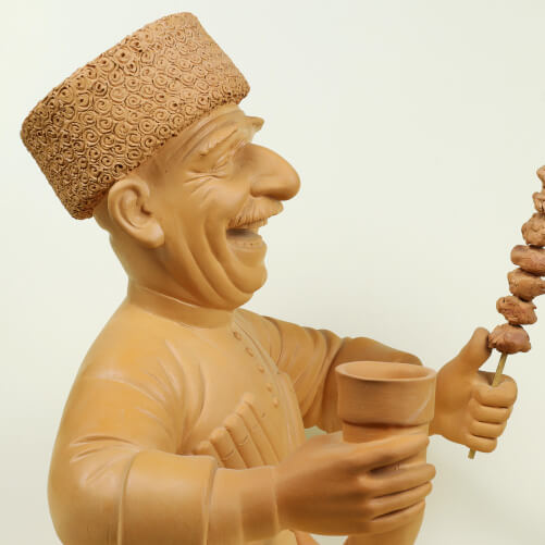 Изображение «Авторская статуэтка Горец с шашлыком глиняная»