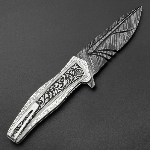 Изображение «Складной нож Раптор рукоять серебро клинок перо дамаск»