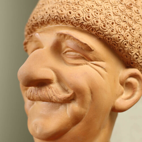 Изображение Авторская статуэтка Горец с гармонью глиняная