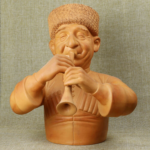 Изображение Авторская статуэтка Горец музыкант глиняная